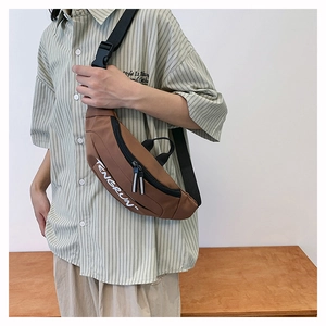 Close-up of brown casual waist bag with white Tengrun logo and adjustable black strap