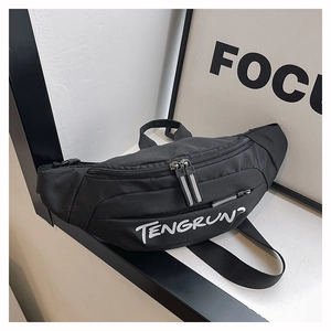 Detail of black sports waist bag featuring TENGRUN logo and reflective zipper pulls