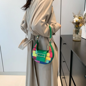 Chic multi-color patchwork crescent shoulder bag for women with gold clasp and green strap