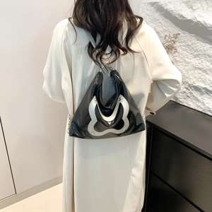 Glossy black butterfly style shoulder bag with white wave design and chain strap