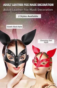 Detail shot of black and red leather fox masks with decorative metal rivets for parties