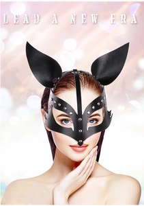 Detail of fox leather mask with silver metal rivets and pointed ears for cosplay party