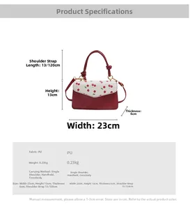 Detailed view of strawberry print shoulder bag with dimensions and material specifications