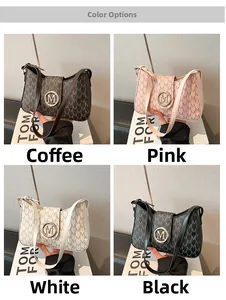 Detail of elegant half-moon shoulder bags with M-pattern print in four classic colors
