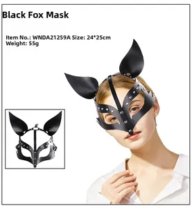 Detailed view of black leather fox mask with punk style metal rivets and elastic strap