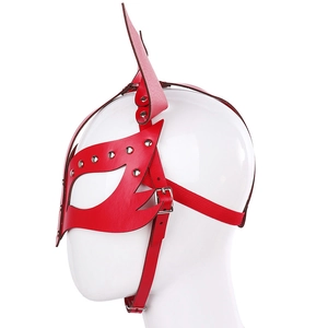 Detail of red leather fox mask with silver studs and adjustable buckle straps for cosplay