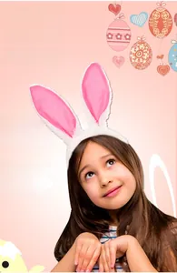 Detail of plush Easter bunny headband with soft white fur and pink ears on festive background