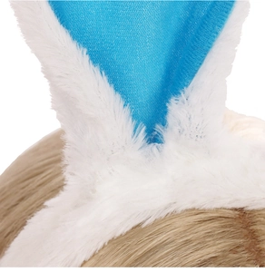 Detail of white plush rabbit ears with blue fabric lining on a headband close-up