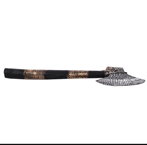 Detailed close-up of Stormbreaker replica ax blade with intricate metallic engraving