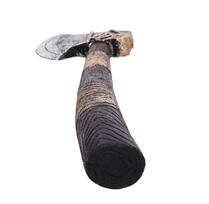 Close-up of Viking battle axe prop with aged metal finish and wood texture handle
