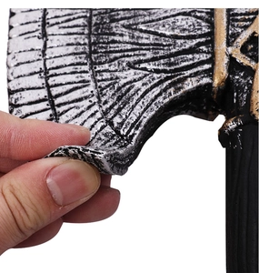 Detail showing the flexible and soft PU foam material of this realistic cosplay axe toy