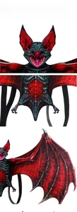 Detailed view of red and black bat wings showing digital printing and elastic straps