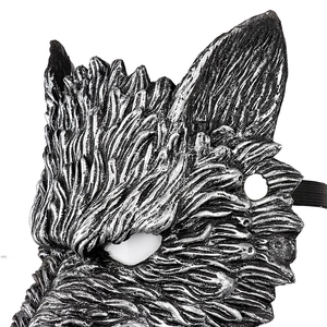 Macro side view of silver werewolf mask showing detailed fur texture and elastic strap