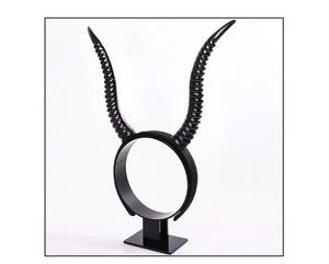 Detailed view of black gothic devil horn headband with textured spiral patterns for cosplay