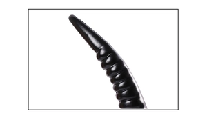 Macro shot of black devil horn headband with realistic spiral texture for cosplay