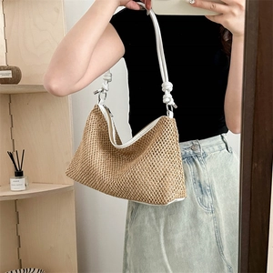 Retro handmade woven tote bag with white rope shoulder strap and silver zipper detail