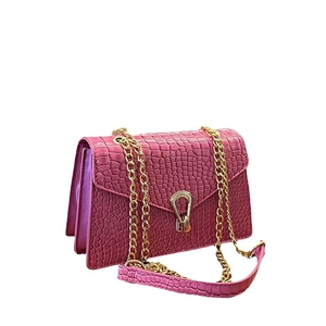 Pink crocodile pattern shoulder bag with gold horseshoe clasp and chain strap