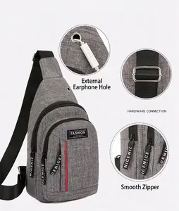 Nylon sling bag with headphone jack, metal buckle and fashion zipper detail