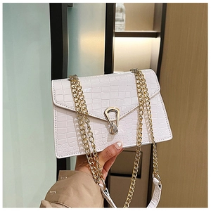 Modern white crocodile pattern crossbody bag with gold chain strap and metal clasp