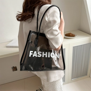 Minimalist transparent PVC tote bag with black trim and inner pouch for women