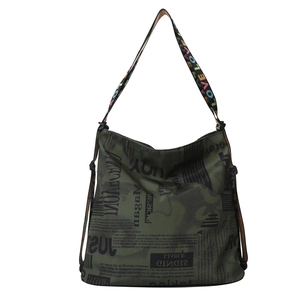 Olive green tote bag with artistic newspaper print and embroidered wide strap