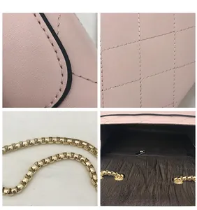 Detail view of pink quilted handbag with gold chain strap and interior zipper compartment