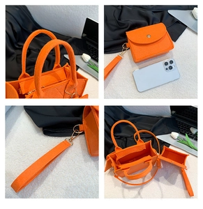 Detailed views of orange felt tote bag set with small coin purse and leather handles