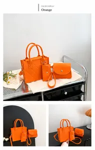 Three-piece orange felt bag set featuring diamond quilted stitching and metal hardware