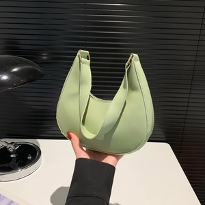 Elegant light green crescent hobo shoulder bag for women with golden metal buckles