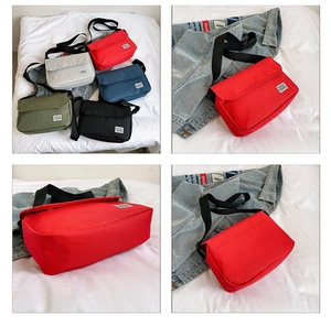 Detailed view of canvas messenger bags in multiple colors with adjustable nylon straps