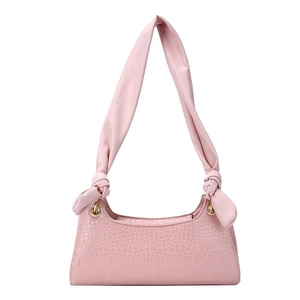 Pink faux leather underarm bag with crocodile pattern and knotted strap detail