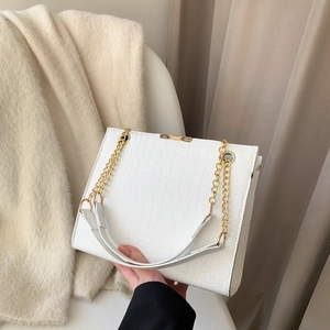 Chic white faux crocodile embossed chain shoulder bag with elegant gold hardware