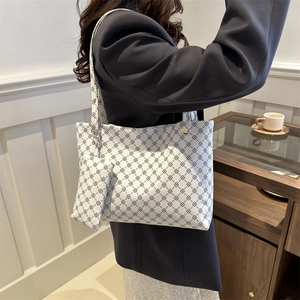 Classic white monogram tote bag set with clover pattern and matching small pouch