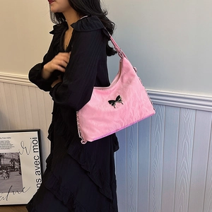 Pink satin tote bag with metallic butterfly buckle and side chain detail for women