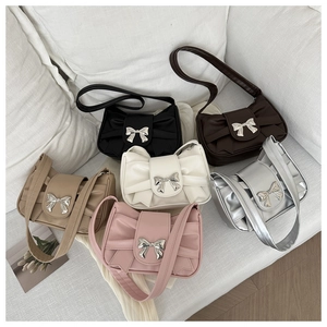 Fashionable ruched underarm bag with metal bow detail in six assorted elegant colors