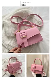Detailed views of a pink faux leather handbag with gold buckles and adjustable strap