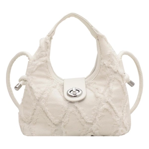 Sac seau blanc en toile matelassée avec bords effilochés et fermoir rotatif argenté