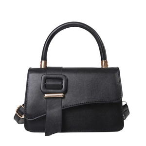 Minimalist black tote bag for women with leather buckle and gold hardware on white background