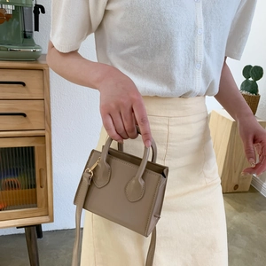 Chic mini rectangle crossbody bag in khaki matte faux leather with gold hardware detail
