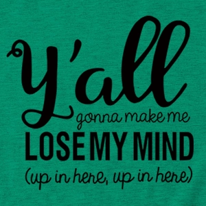 Detail of green cotton T-shirt featuring black printed slogan text on soft knit fabric