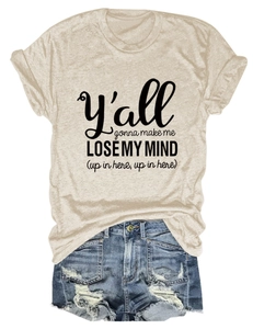 Detail of oatmeal crew neck T-shirt with black lyrics print and ripped denim shorts