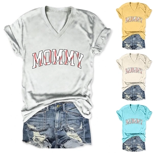 Close-up of V-neck MOMMY t-shirt options in white, yellow, beige and light blue