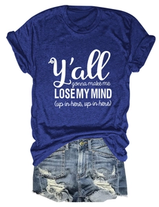 Flat lay of navy blue short sleeve T-shirt with white text and distressed denim shorts