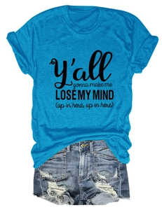 Flat lay of blue cotton letter print t-shirt paired with distressed denim shorts