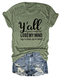 Olive green crew neck T-shirt with letter print paired with distressed denim shorts