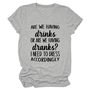 Close-up of grey crew neck T-shirt with black drink slogan print and fabric texture