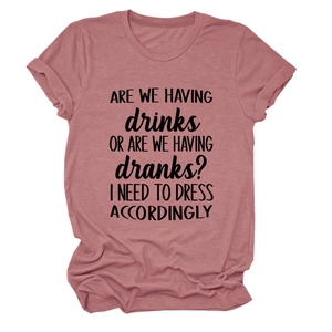 Detail of the crew neck and rolled sleeves on the mauve cotton t-shirt with humor text