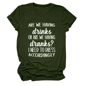 Flat lay of olive green crew neck T-shirt featuring white humorous quote print