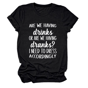 Detail of black cotton T-shirt featuring 'ARE WE HAVING DRINKS' funny text print