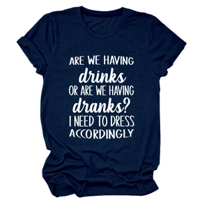 Detail of navy blue cotton T-shirt featuring 'Are we having drinks' printed slogan